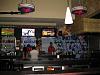 Fridays bar with televisions with sports.JPG‎